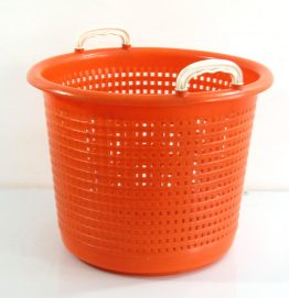 Orange plastic laundry basket sixties vintage