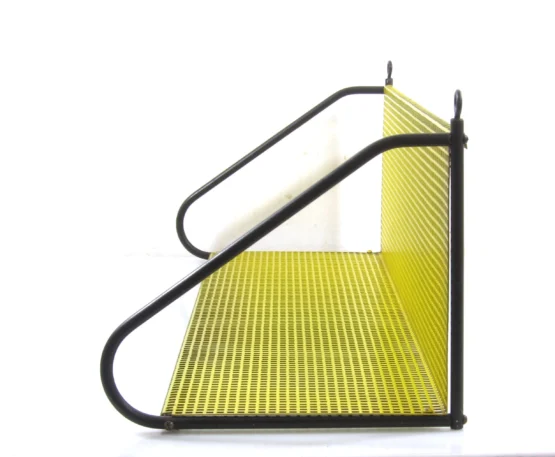 Handy fashion concious perforated 1950s vintage yellow bookshelf designed by Tjerk Rijenga for by Pilastro