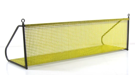 Handy fashion concious perforated 1950s vintage yellow bookshelf designed by Tjerk Rijenga for by Pilastro