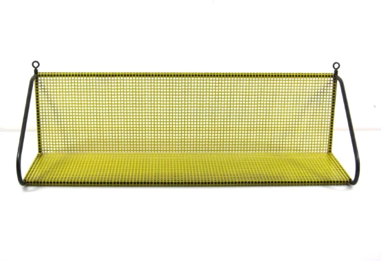 Handy fashion concious perforated 1950s vintage yellow bookshelf designed by Tjerk Rijenga for by Pilastro 5